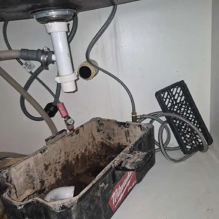 Under-sink drain cleaning work for a slow kitchen sink in Muskogee, OK