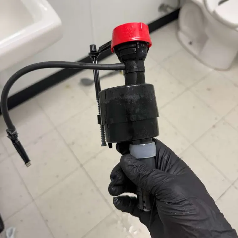 Toilet fill valve replacement for a plumbing service in Muskogee