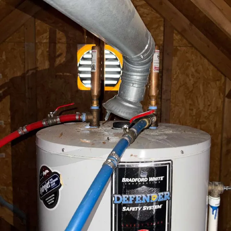Attic water heater inspected during a Clog Hunter service call in Muskogee OK