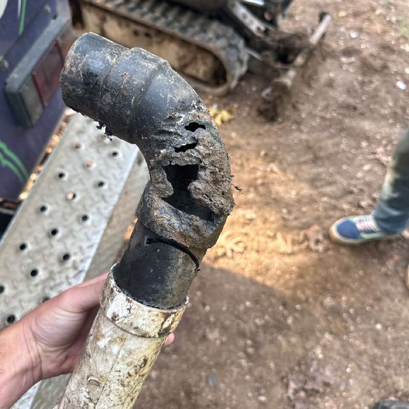 Damaged sewer pipe removed during a sewer line repair in Muskogee, OK