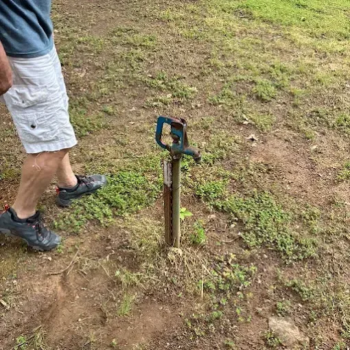 Clog Hunter servicing a well pump in a rural Eastern Oklahoma yard